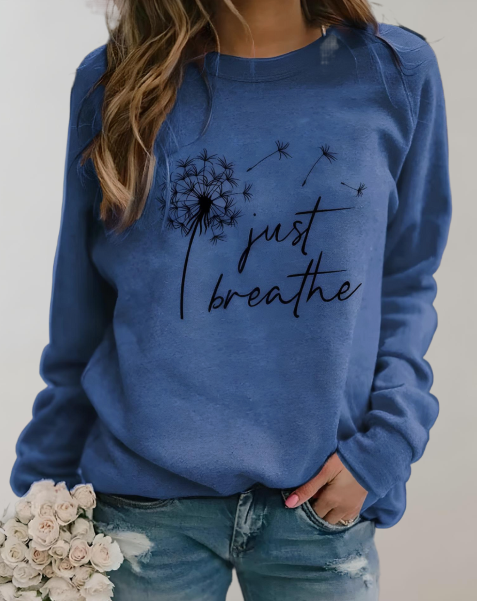 Sara – Pull oversize à col rond avec inscription "Just Breath"