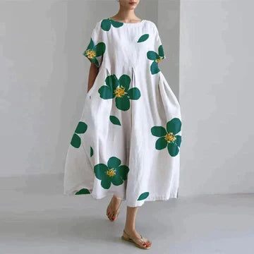 Robe longue blanche à imprimé de fleurs vertes pour un style décontracté